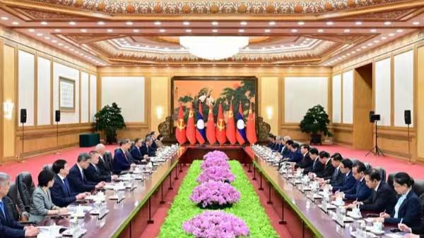 深化同志情谊 夯实务实合作|习近平同老挝国家主席通伦在北京会谈,擘画新时代中老命运共同体新蓝图